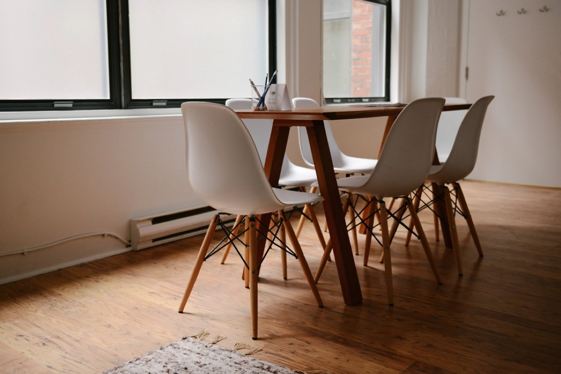 Modern chairs and table in a bright room